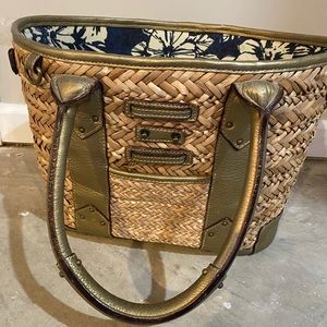 jcrew woven bag with gold straps and navy floral